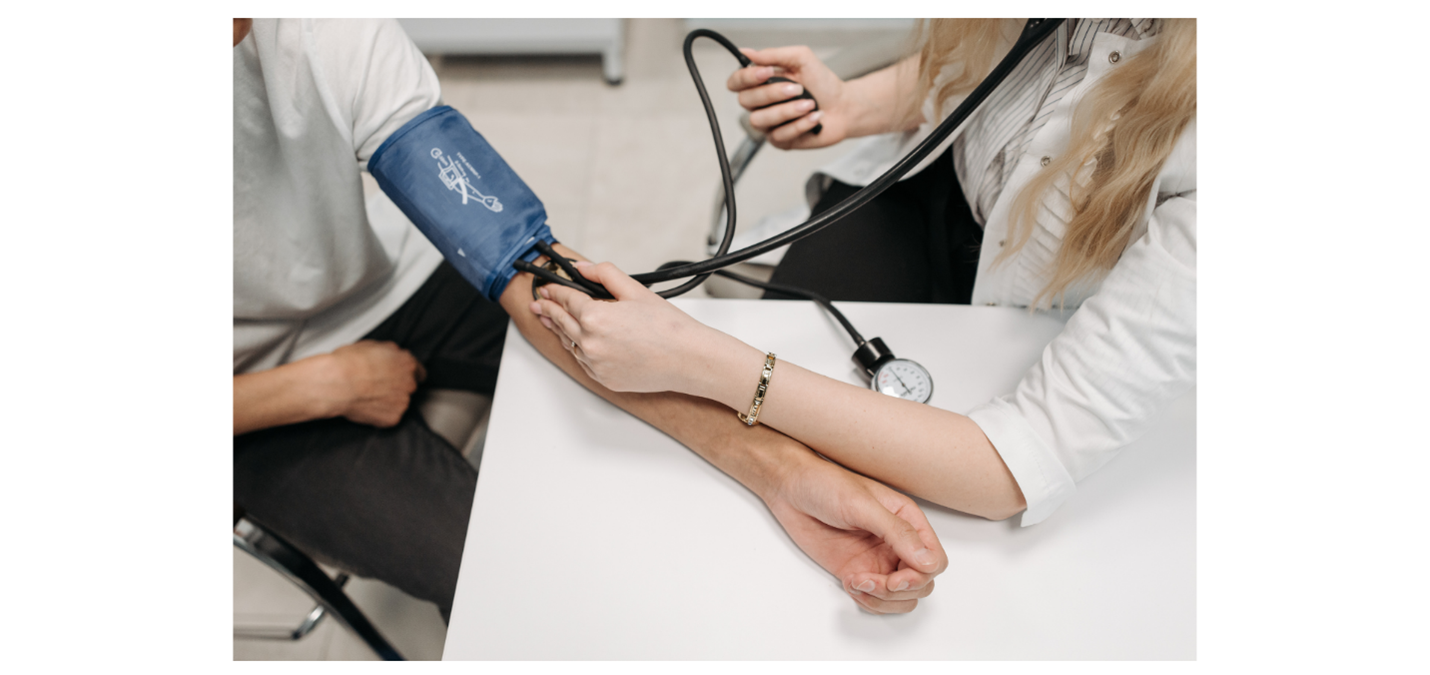 Patient having their blood pressure taken.